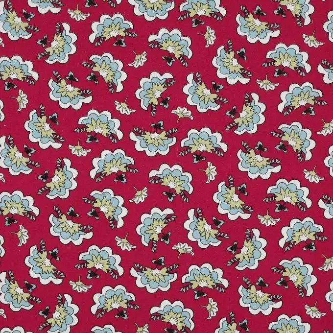 Tessuto rosso con fiori bianchi