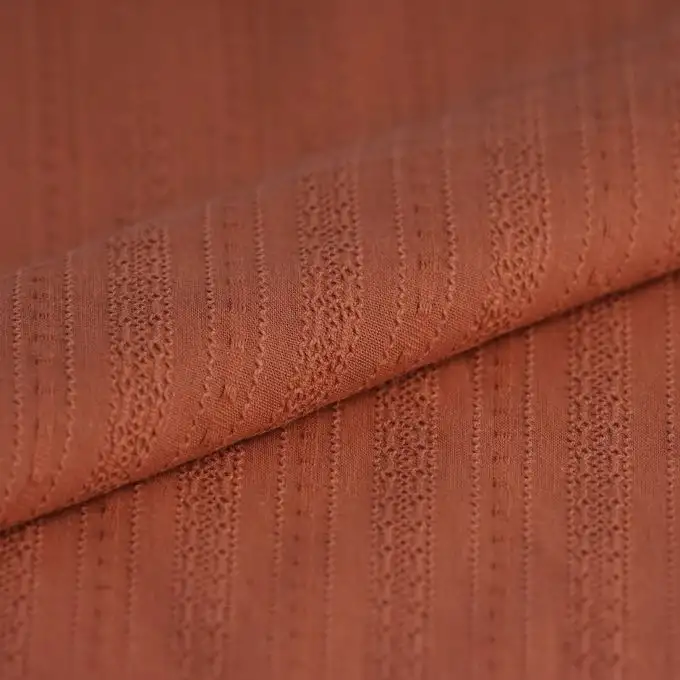 Tessuto tela cotone rilievo terracotta