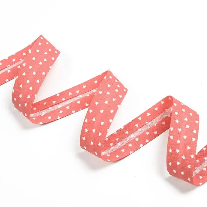 Bordo in cotone stampa piccolo cuore ecru e salmone