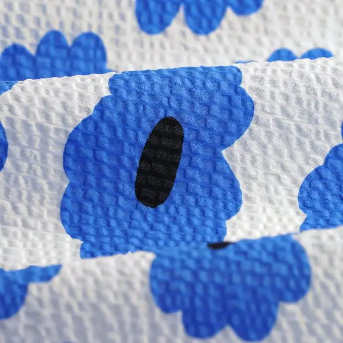 Tessuto seersucker cotone fiori blu