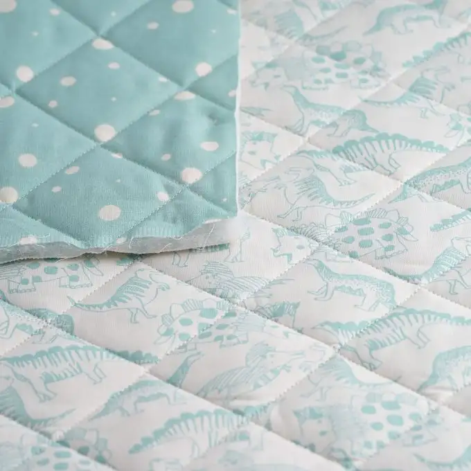 Tessuto trapuntato dinosauri