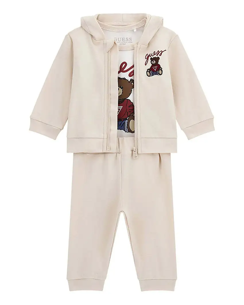 Tuta Guess in puro cotone color panna e body con orsetto